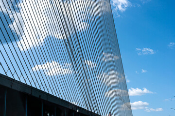 Low-strength steel pylon cables on a concrete bridge