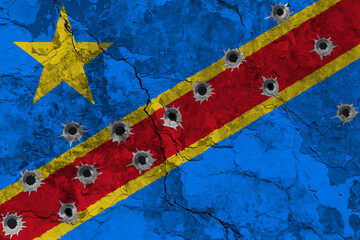 Concept of the Armed Conflict in the Democratic Republic of the Congo (Congo-Kinshasa) with a painted flag on a cracked wall with wholes of bullets. 3D-Illustration. 3D-rendering