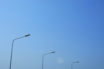Fototapeta na wymiar a streetlamps day the sky