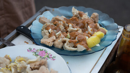 a plate of Indonesian street food from bandung called shumai or dimsum