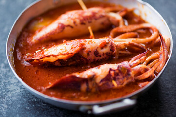 rustic italian stuffed calamari in tomato sauce