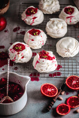 Blood orange pavlova.style hugge. selective focus