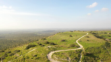 green hill revealing Judea plains in Israel
, drone view February 2021
