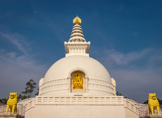 buddhist stupa isolated with amazing blue sky from unique perspective