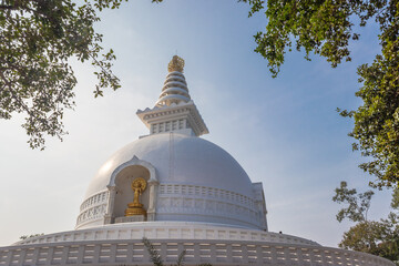 buddhist stupa isolated with amazing blue sky from unique perspective