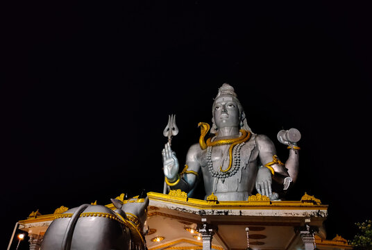 huge shiva statue isolated with black background
