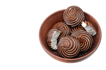 Chocolate-covered marshmallow close-up, isolated on a white background.Selective focus.