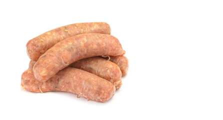 Raw pork sausages. Grilled sausages, spices close-up, isolated on a white background.Selective focus.