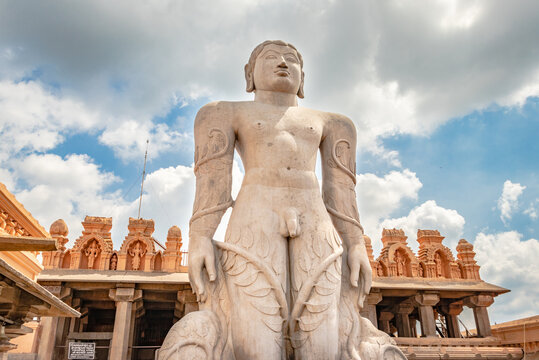 idol of a deity stone statue symbolizing Peace in Jainism with blue sky from different angles