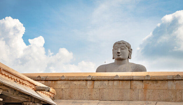 idol of a deity stone statue symbolizing Peace in Jainism with blue sky from different angles