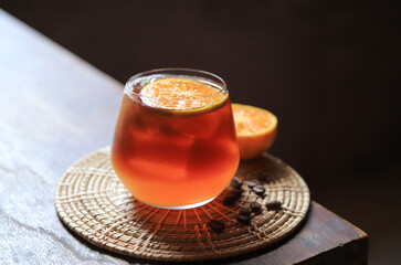 Fresh iced coffee making with orange juice for fresh drinking