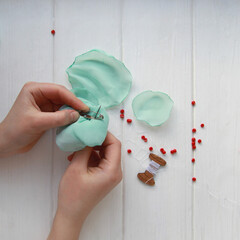 How to make a flower brooch from organza. Step 6. Sew on the brooch clasp on the back of the...
