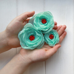 How to make a flower brooch from organza. Step 7. Organza flowers are ready. You can make a brooch,...