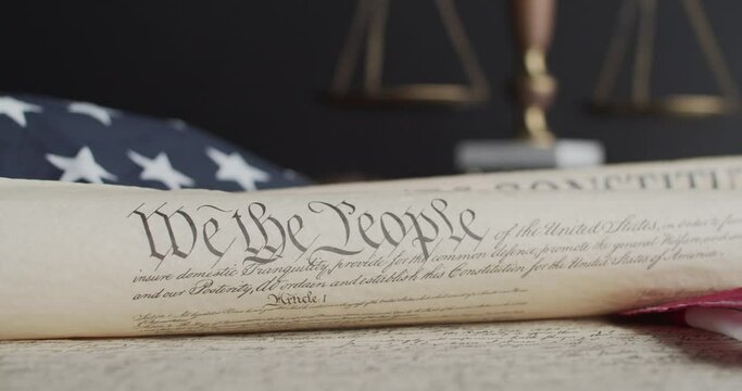 US constitution and US flag