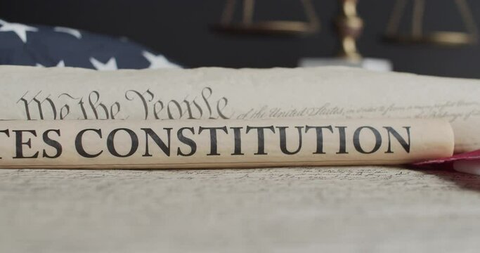 US constitution and US flag