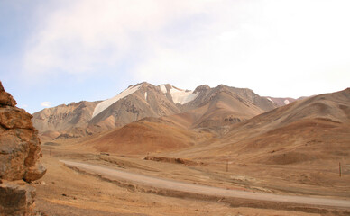 Spectacular view on snow-capped mountains in Gorno-Badakshan, the Pamir region of Tajikistan. Snow covered peaks of Pamir mountains