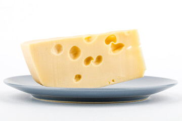 cheese on a plate, isolated on a white background.