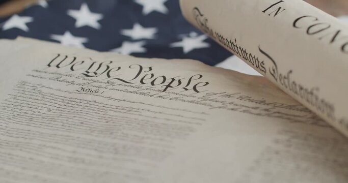 US constitution and US flag