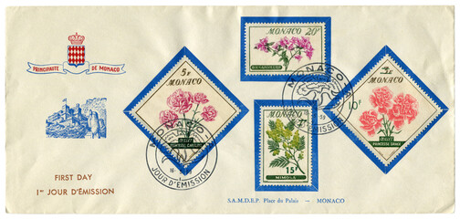 Principality of Monaco - 16 May 1959: historical envelope: cover with floral theme, four postage stamps with flowers: carnation, bougainvillea mimosa.