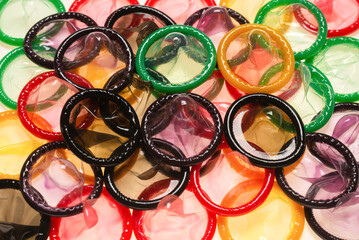 Colorful condoms background.