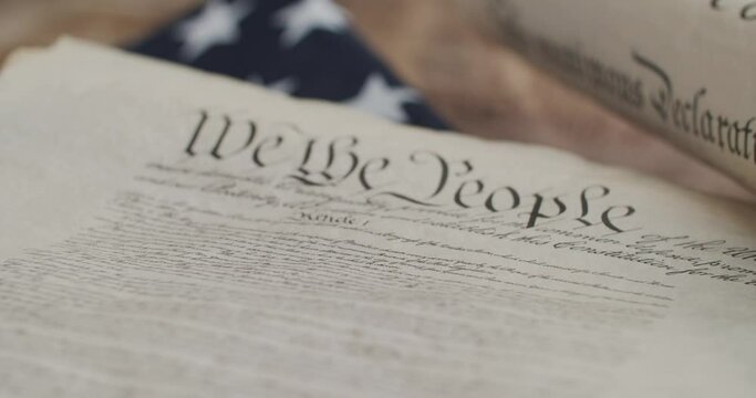 US constitution and US flag