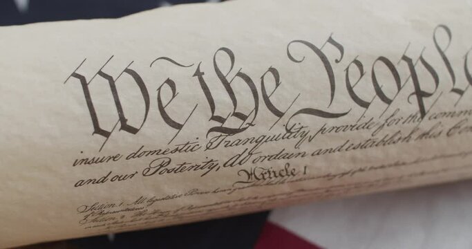 US constitution and US flag