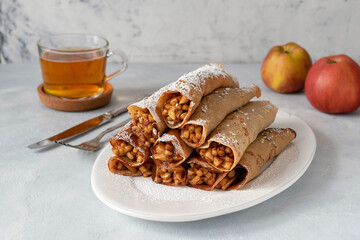 Pancakes with apples and cinnamon.
