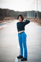 Portrait of beautiful asian chic girl pose for take a picture,Lifestyle of teen thailand people,Modern woman happy concept,Punk rock style