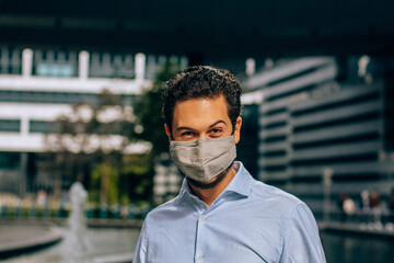 Business man in protective mask 