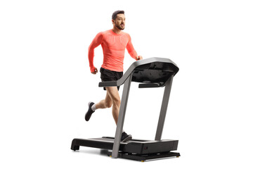 Full length shot of a fit young man running on a treadmill