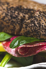 Homemade Sausage Sandwich with Lettuce and Cheese on Seed Bread