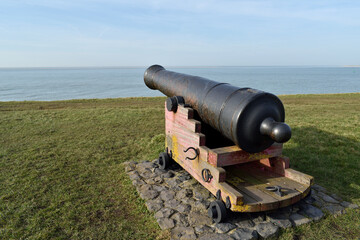 An antique cannon from the Napoleonic era at Fort Kijkduin history museum in the Netherlands