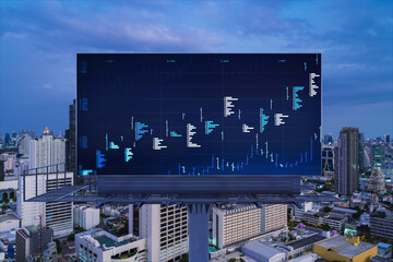 FOREX graph hologram on billboard, aerial night panoramic cityscape of Bangkok. The developed location for stock market researchers in Southeast Asia. The concept of fundamental analysis