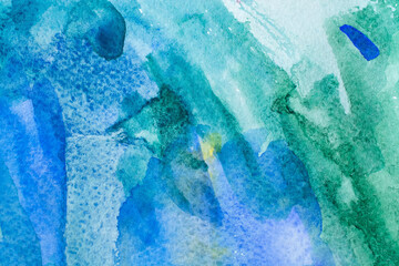 blue and green watercolors on paper texture