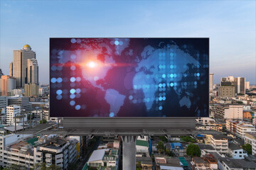 Glowing hologram of Earth planet map on billboard over aerial panoramic cityscape of Bangkok at sunset. The concept of international business in Southeast Asia.