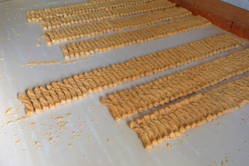 peanut crunchy candy on the chopping board