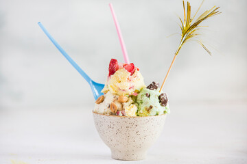 Ice cream with strawberry, peanut, chocolate