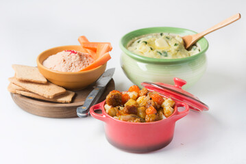 salmon pate with red caviar served, sliced bread and parrot.