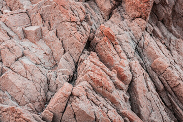 Red and pink rocks, wind erosion, geology, air oxidation. Teal and orange lighting, endless stratifications, and soft pastel-colored clouds.