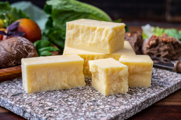 Cheese collection, pieces of aged British cheddar cheese