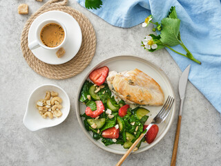 Fried Chicken Breast with Fresh Strawberry Cucumber Salad.