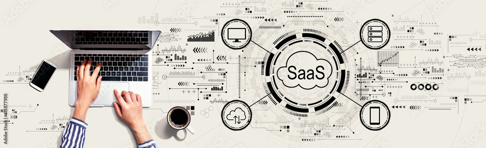 Poster saas - software as a service concept with person using a laptop computer