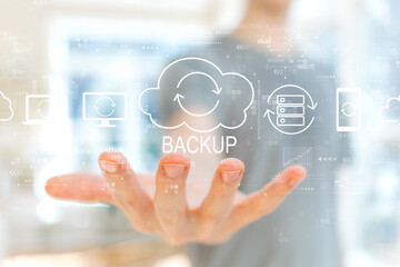 Backup concept with young man holding his hand