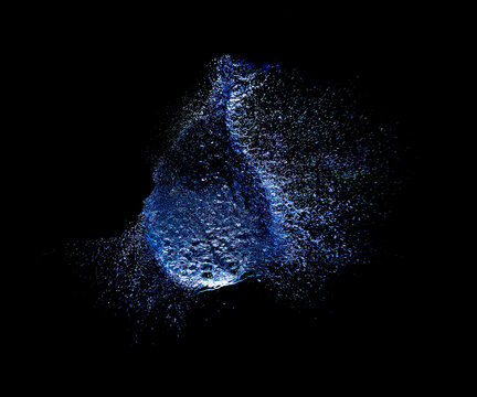 Blue color water balloon on black background