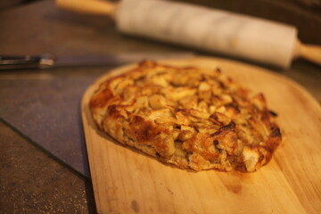 apple pie on a wooden board