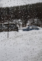 drops on the glass of the house window