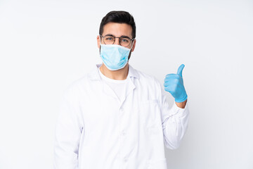 Young dentist man isolated on white background 