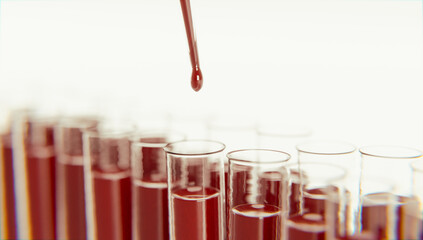Reagenzgläser mit Blutproben mit Pipette in Labor