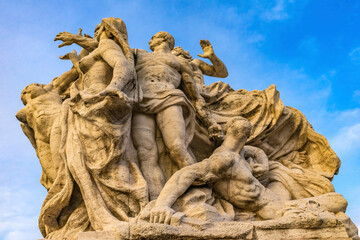 Roman statue on Ponte Bridge Vittorio Emanuele II, Tiber River, Rome, Italy. Bridge first built late 1800's.