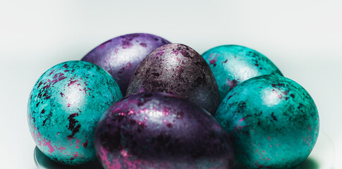Close-up of colored Easter eggs. Screensaver for the bright holiday of Easter. High quality photo